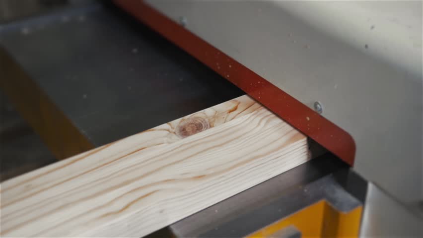 Modern Furniture Video man using a table saw to cut wood, grinding on modern furniture Modern Furniture Video man using a table saw to cut wood, grinding on modern furniture