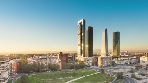 madrid skyline cityscape timelapse from day to night aerial view of skyscrapers business area