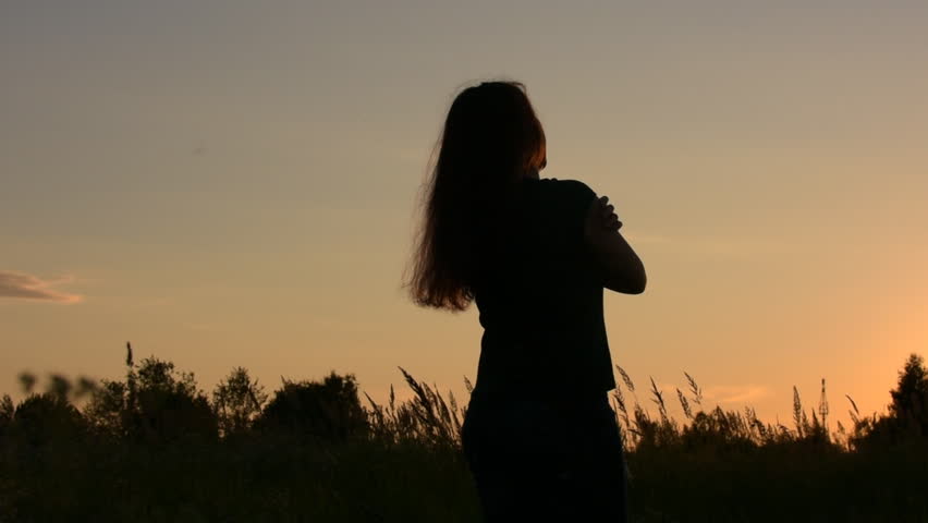 Girl Puts Her Head On The Shoulder Of The Man In Sunset Medium Shot Stock Footage Video