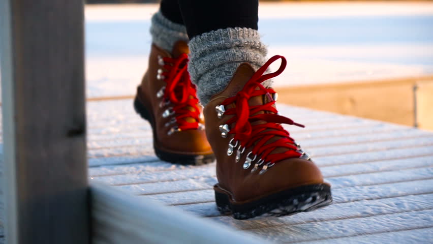 brown leather boots with red laces