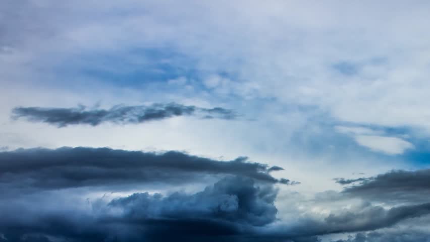 Real Rain Cloud rain storm coming in fast across the sky in real time. stock Real Rain Cloud rain storm coming in fast across the sky in real time. stock