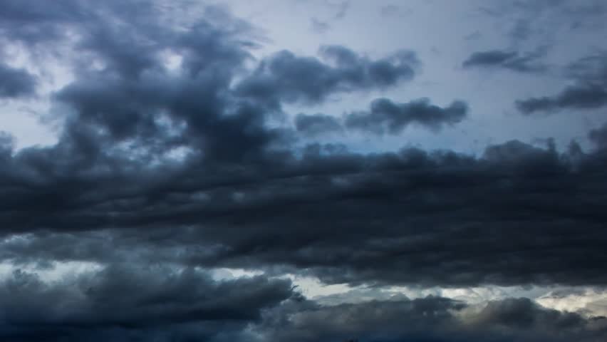 Real Rain Cloud rain storm coming in fast across the sky in real time. stock Real Rain Cloud rain storm coming in fast across the sky in real time. stock