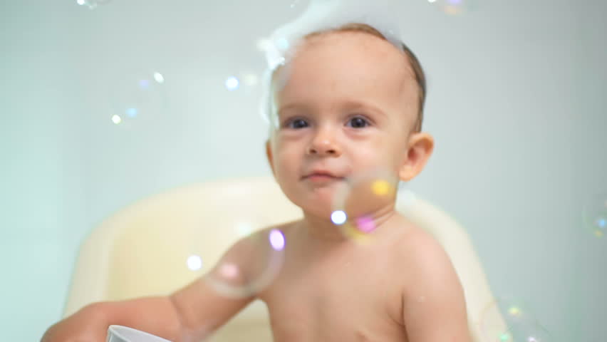 Two Year Old Boy Plays In The Bath Slow Motion Stock Footage Closeup Slow Motion Footage Of Baby Boy Having Fun In Bathroom Hd Stock Clip