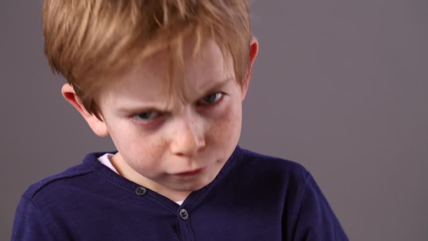 Stock video of closeup of an angry little boy | 23867575 | Shutterstock