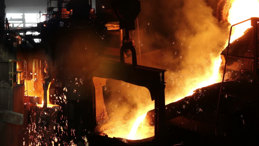 Hard Work In The Foundry, Worker Controlling Iron Smelting In Furnaces ...