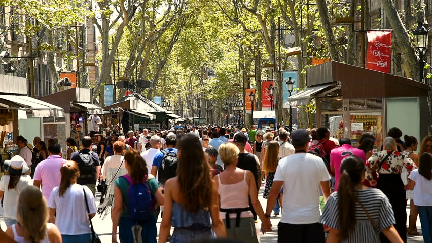 People Walking Background In Barcelona, La Rambla. Pedestrians Walking ...