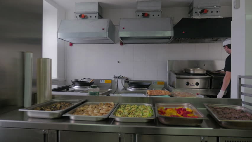 Restaurant Kitchen Chefs busy chefs cooking in restaurant kitchen stock footage video Restaurant Kitchen Chefs busy chefs cooking in restaurant kitchen stock footage video