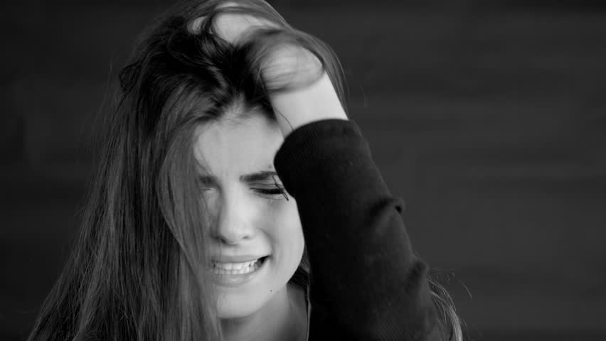 Young Woman Screaming And Crying Desperate Closeup Black And White Slow