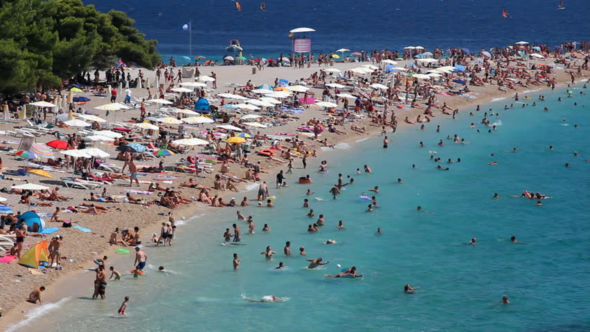 People On The Beach Sunbathing Stock Footage Video 100 Royalty People On The Beach Sunbathing Stock Footage Video 100 Royalty Free 2687675 Shutterstock