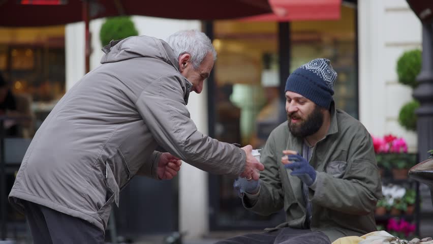 homeless helping generosity shutterstock