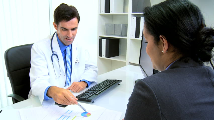 Female Hispanic Doctor Meeting Male Hospital Clinic Office Manager ...