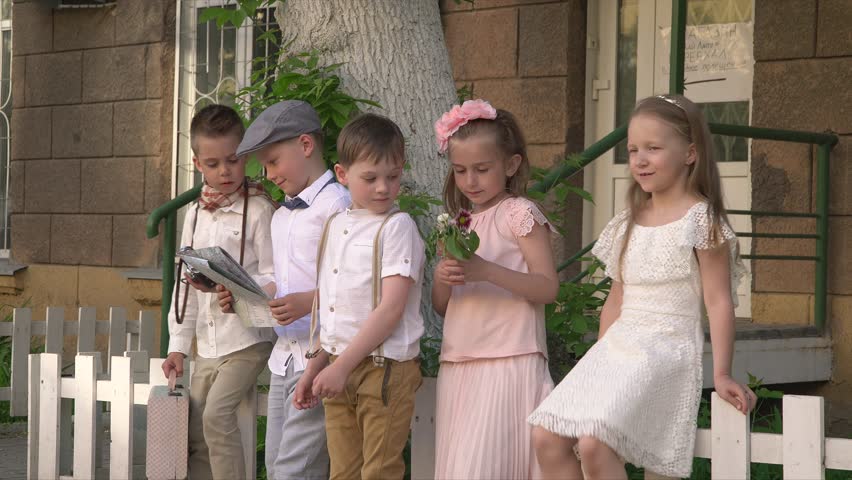 small children the company sit on a small white fence 4k stock footage clip - Pics Of Small Children small children the company sit on a small white fence 4k stock footage clip - Pics Of Small Children