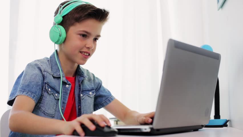 Child Using Laptop Little Boy Playing Computer Games Using Touchpad