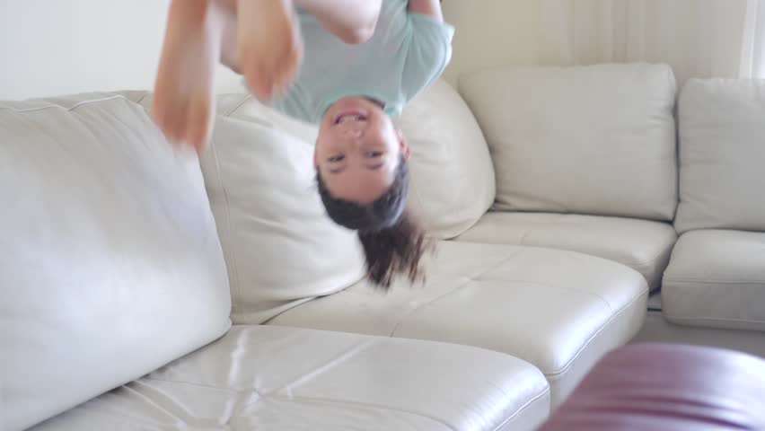 Young Kid Jumping On Couch Stock Footage Video 100 Royalty