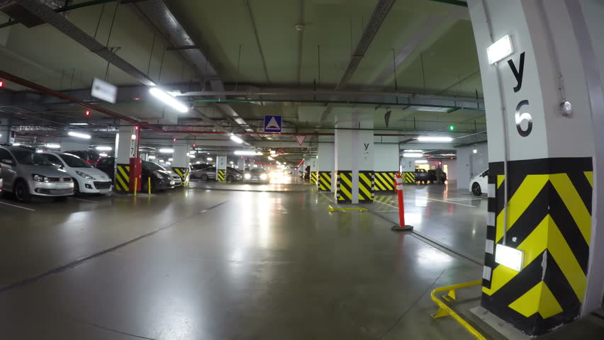 Car Drives Through Shopping Mall Car Drives Through Shopping Mall
