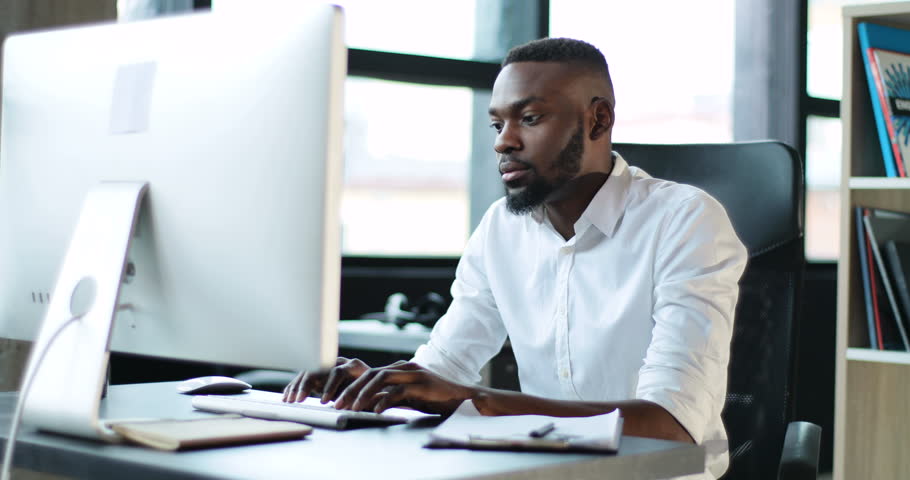 Image result for BLACK MAN WORKING AT THE OFFICE