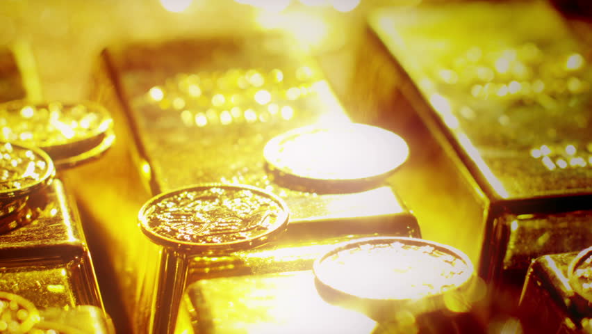 Gold bars, coins and riches. A scene of cluttered treasure and diamonds. Unimaginable wealth.