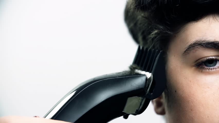 Haircut Machine Going Through Hair Stock Footage Video 100 Royalty Free 6181355 Shutterstock