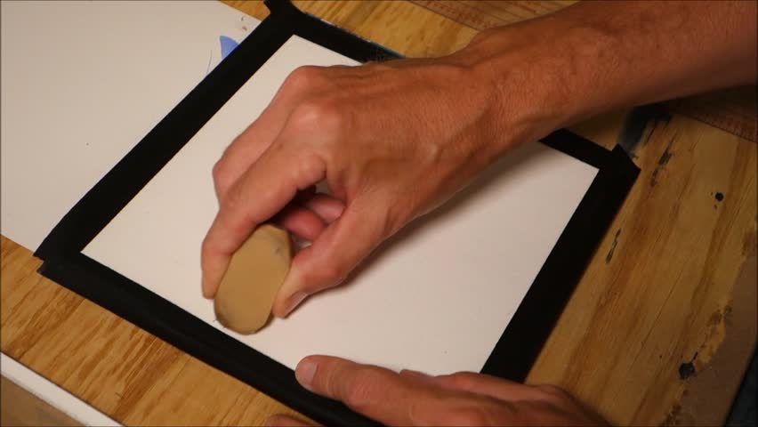 Person Using Eraser  to Remove Stock Footage Video 100 