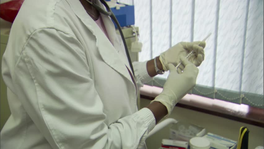 Image result for nurse injecting baby kenya