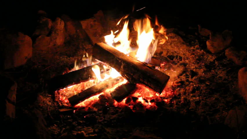 Rock Fire Pit With Small Fire Burning