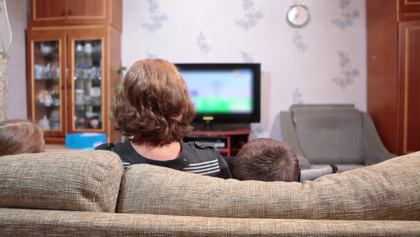 Living Room With Tv And People four people family using smart tv at evening meeting in living Living Room With Tv And People four people family using smart tv at evening meeting in living