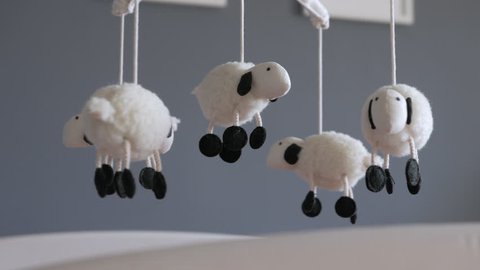 Lamb Nursery Mobile Spinning Above Stock Footage Video 100