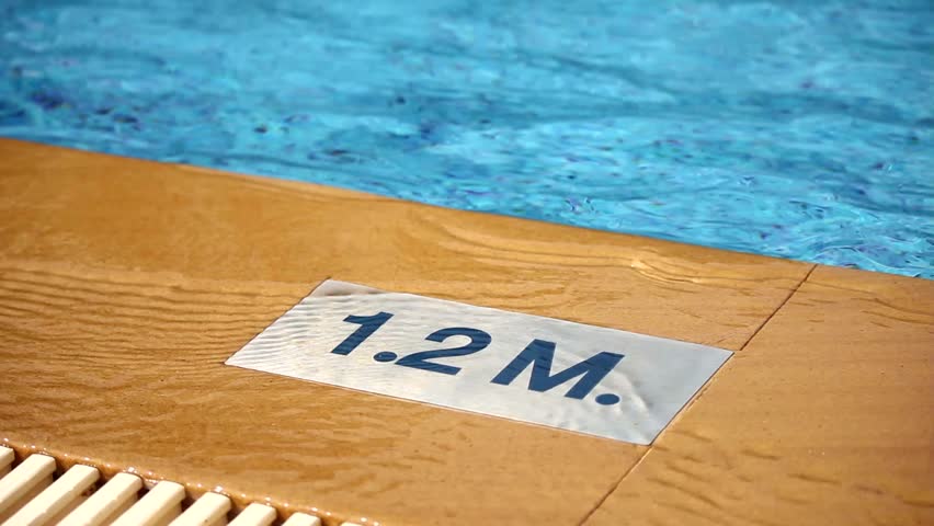 “1.2 M.” Depth Marking On Pool Edge.inscription Of The Swimming Pool