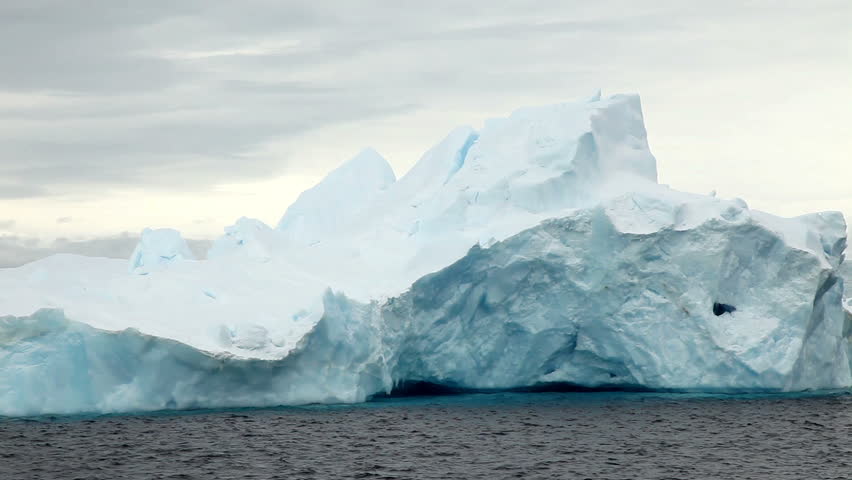 Large Floating Iceberg Broken From A Glacier Stock Footage Video ...